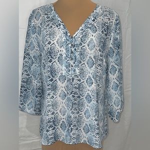 White House Black Market snake pattern long sleeved blouse. Size 12.